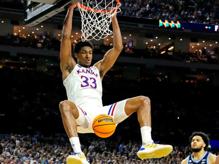 Kansas Jayhawks forward David McCormack (33) dunks the ball against dunks the ball against Villanova Wildcats